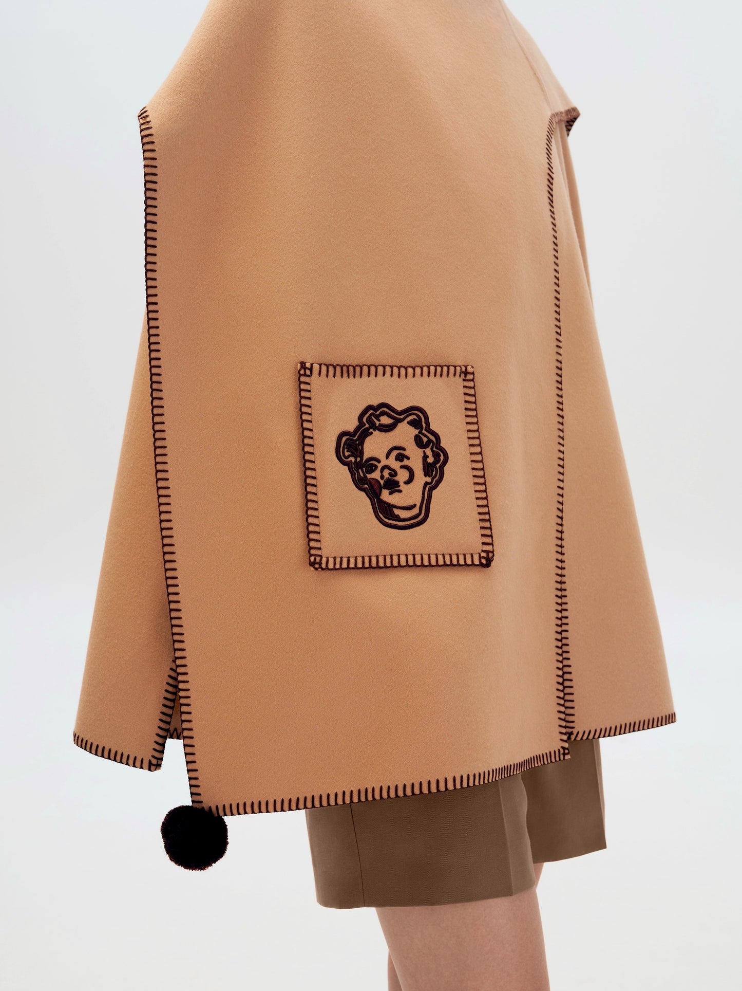 Пончо асиметричне коричневе